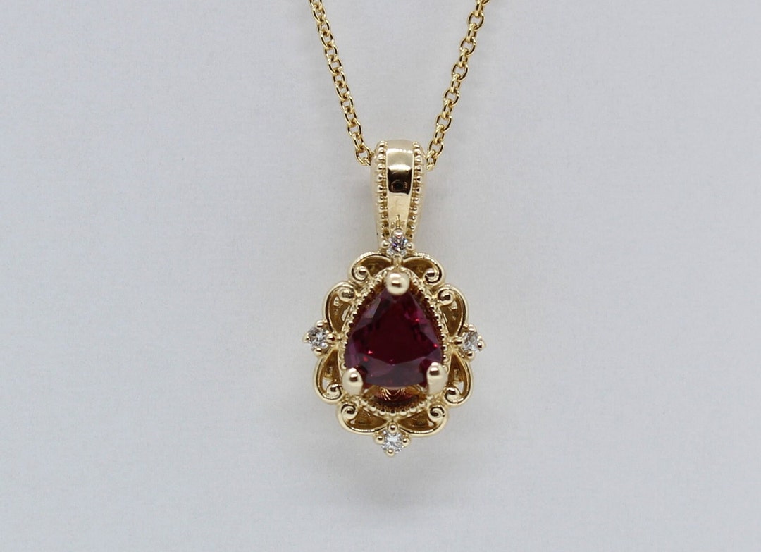 gorgeous ruby pendant. take your style up by adorning... Ruby Pendant With Diamond Accents - Etsy
