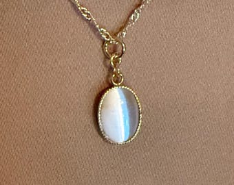 Dainty White Cats Eye Cabochon in Gold bezel, Gold Twisted Chain
