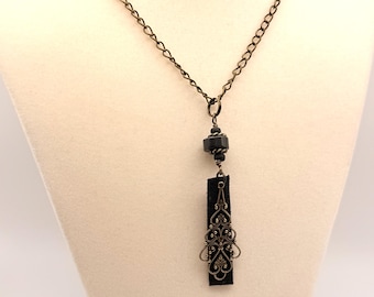 Antique Bronze Filigree Necklace: Onyx & Black Faux Suede Pendant