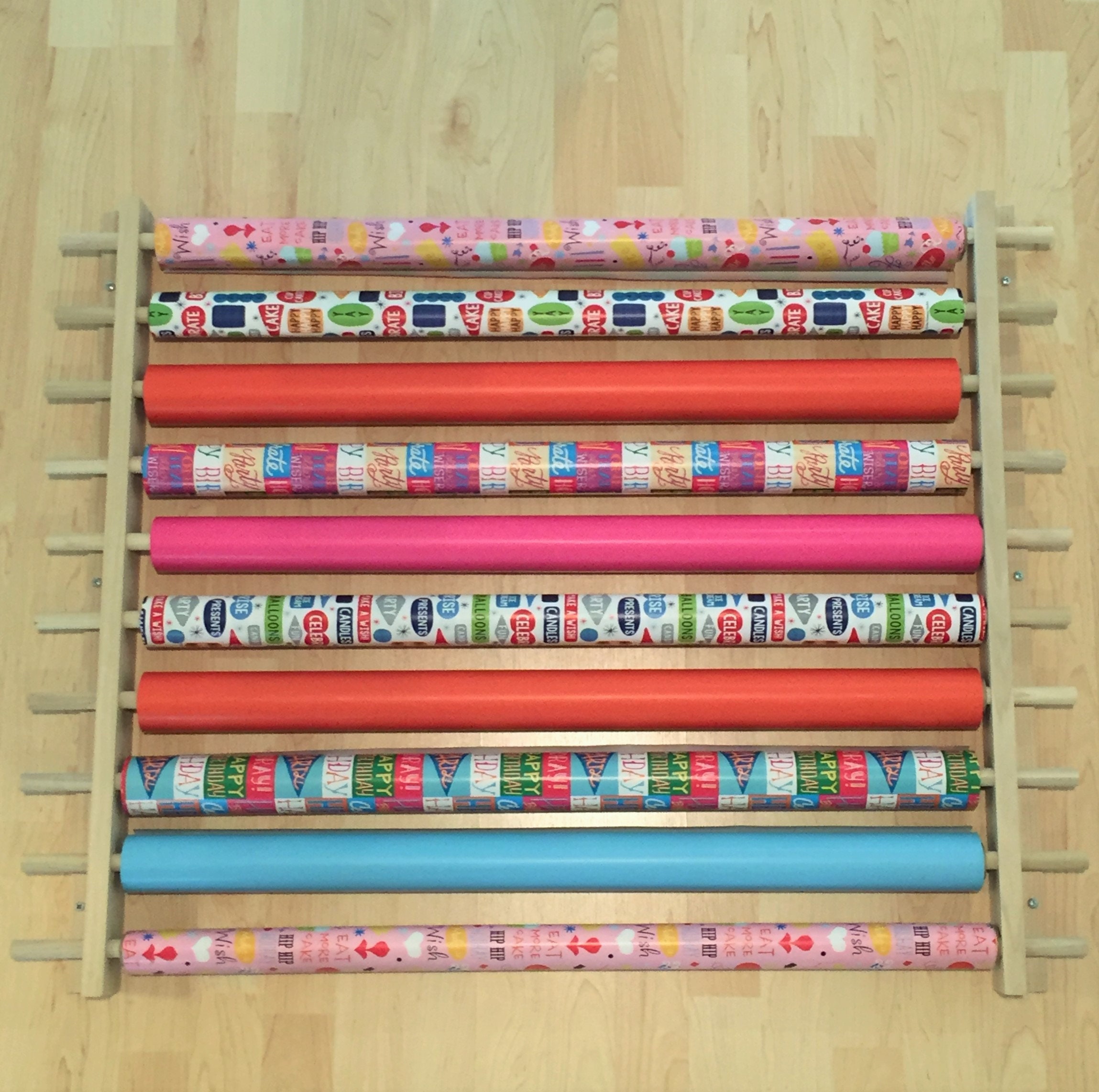 Z-Things Storage, Organizer, Dispensing Rack for Gift Wrapping Paper, Ribbons, Cellophane, Vinyl Rolls, Paper, Maps etc. Holds 10 Rows. Adjustable