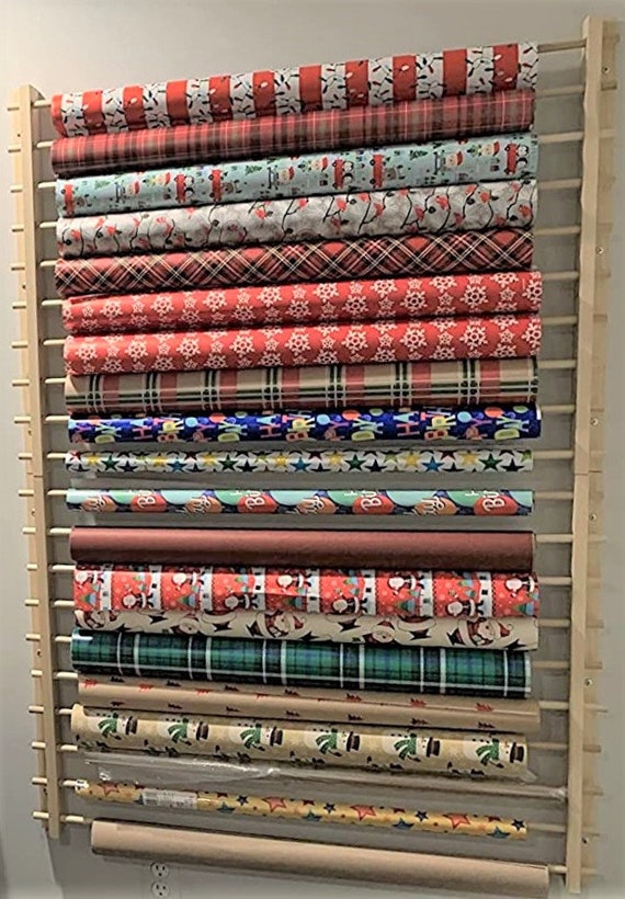 My new pantry shelves lined with wrapping paper from Michaels
