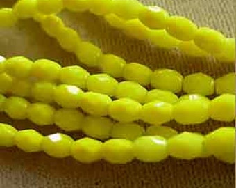 50 vintage yellow fire polished oval glass beads #8519