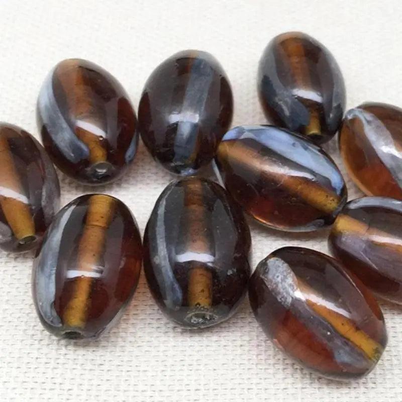 10 Vintage Amber Silver Striped Oval Glass Beads