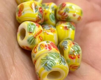 10 vintage gele Japanse millefiori rolglaskralen