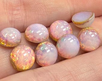 8 vintage ronde glazen cabochons van vuuropaal