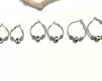 Soccer Hoop Earrings. Prices vary due to size 12.00 - 14.00