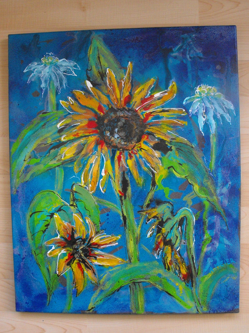 May include: A painting of sunflowers and other flowers on a blue background. The sunflowers are yellow, orange, and red. The other flowers are white and blue. The painting is done in a loose, expressive style.