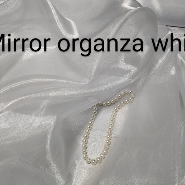 Mirror Organza White 59" by the yard. Shinny sheer organza for dresses, bows, Free swatches, Threads and "rush" shipping available.