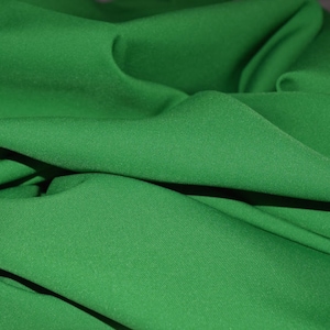 Kelly Green (New Kelly)   Gabardine Tropical 60 to 62&quot; wide, by the yard  Free swatch and &quot;rush&quot; shipping available.