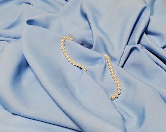 Light Blue   Gabardine Tropical 60 to 62&quot; wide, 100% Polyester by the yard   Free swatch and &quot;rush&quot; shipping available.