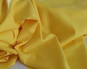 Gelbe Zitronen Gabardine Tropical 60 "bis 62" breite Massenware.  100%Polyester. Kostenloser Musterversand und Eilversand möglich.