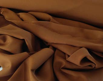 Copper Gabardine Tropical  60 to 62" wide  100% Polyester by the yard.   Free swatches, Threads and "rush" shipping available.