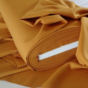 Mustard  Gabardine Tropical 60 to 62" wide, 100% Polyester by the yard   Free swatch and "rush" shipping available.