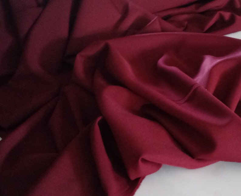 Cranberry Gabardine Tropical 62 wide by the yard.Free shipping in orders 35.00 up Free swatches International shipping.