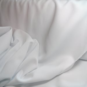 White  Gabardine Tropical 60 to 62&quot; wide, 100% Polyester by the yard. Free swatch and Rush shipping available