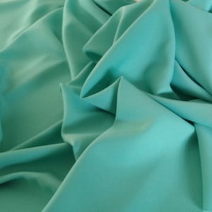 Tifany Blue  Gabardine Tropical 60 to 62" wide, 100% Polyester by the yard   Free swatch and "rush" shipping available.