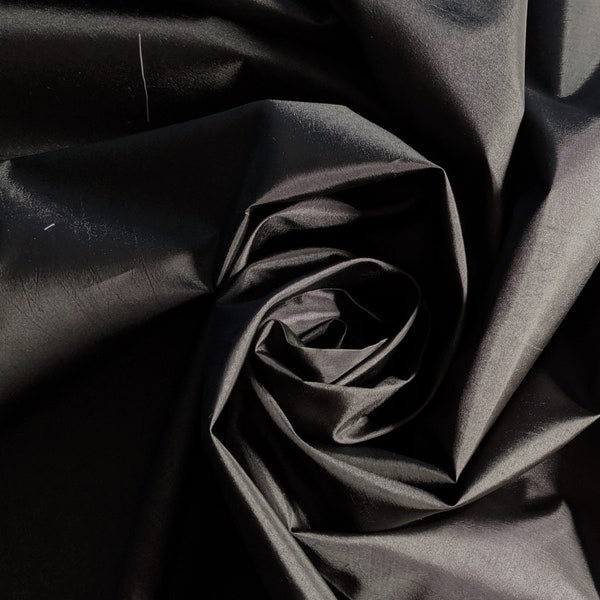 Black taffeta by the yard 58-60" wide. Free swatches upon request, Threads and "rush" shipping available.