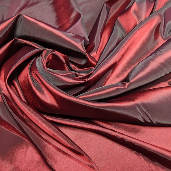 Burgundy taffeta by the yard 58-60" wide. Free swatches upon request, Threads and "rush" shipping available.