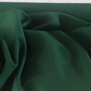 Hunter Green Gabardine Tropical 59" wide 100% Polyester by yard . Free swatches, Threads and "rush" shipping available.