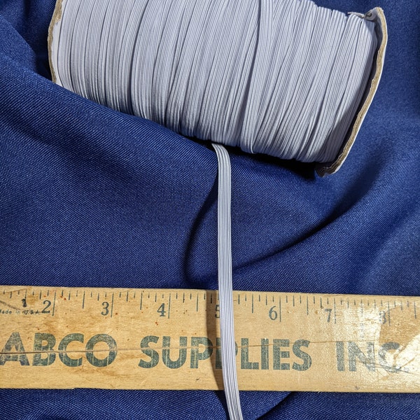 White elastic by yard 1/4" inches 6 mm white, strong, good stretch.