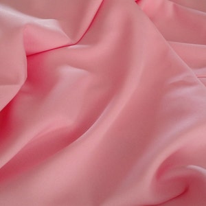 Light Pink  Gabardine Tropical 60 to 62&quot; wide, 100% Polyester by the yard    Free swatchs and &quot;rush&quot; shipping available.