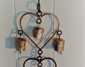 Three iron hearts with bells wind chimes