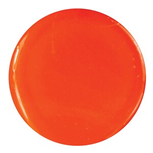 May include: A bright orange circle, resembling a round, flat piece of candy or a gel-like substance.