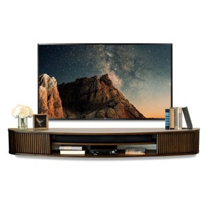 May include: A dark brown curved wall-mounted entertainment center with a black soundbar, shelves, and a closed cabinet door. The entertainment center has a TV on top and books on the shelves.