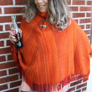 1970&#39;s Orange Wool Poncho with Pewter Clasps and Fringe