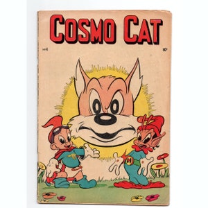 May include: Vintage "Cosmo Cat" comic book cover. The title is in red block letters. The cover features a large cat face with two cartoon characters in the foreground. The comic book is slightly worn.