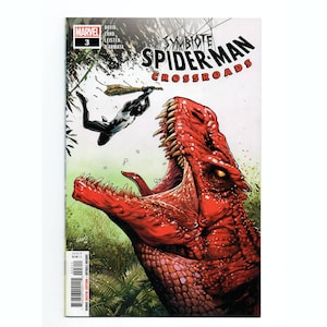 May include: Comic book cover for Symbiote Spider-Man: Crossroads #3. The cover features Spider-Man in a black and white suit, a large red dinosaur, and the Marvel logo. The comic book is set against a green background.