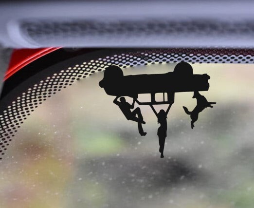 Jeep Gladiator Dog and people falling decal for windshield
