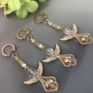 20 Angel keychains for Baptism favors with 20 organza bags  organza bags Recuerditos para bautizo/ wedding favors/ Communion favors/  christ