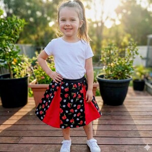 Girls color block pleated skirt.
