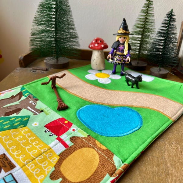 Tapis de jeu enroulable avec porte-jouets Story UKCA