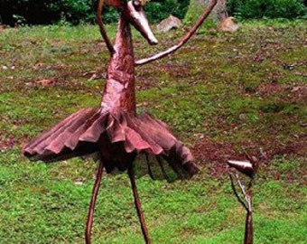 The Lesson, a whimsical outdoor sculpture in copper and bronze