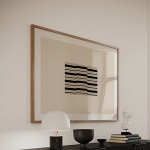 May include: A black metal cabinet with a grid pattern on the doors. The cabinet has two doors and two shelves. There is a lamp, a bowl, and books on top of the cabinet.