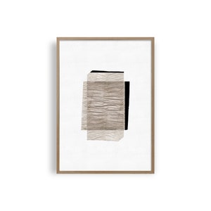 May include: Abstract art print featuring a layered design of textured paper in shades of brown and black. The paper is layered to create a geometric shape.