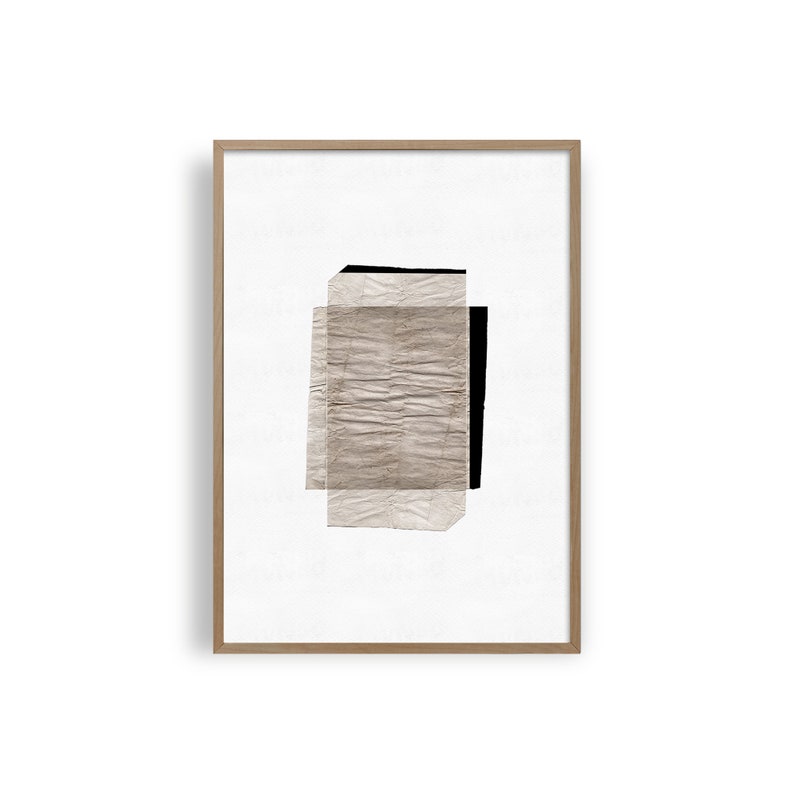 May include: Abstract art print featuring a layered design of textured paper in shades of brown and black. The paper is layered to create a geometric shape.