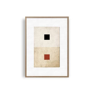 Op de afbeelding: Een ingelijst drukwerk met een minimalistisch ontwerp met een zwarte vierkant op een witte achtergrond en een rode vierkant op een beige achtergrond.