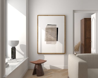 May include: A white room with a large window, a wooden stool, a beige sofa, and a framed abstract art print with brown and black geometric shapes.