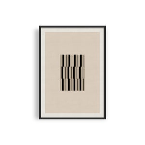 May include: A framed print featuring a black and white geometric pattern on a beige background.