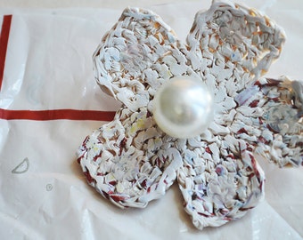 Retro British flower brooch handmade from recycled popular high street store plastic bags. Upcycled jewellery. Cream, red, beaded, unique