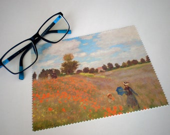 May include: A microfiber cleaning cloth with a printed image of a painting of a field of red poppies with two figures walking in the distance. The painting is signed "Claude Monet".