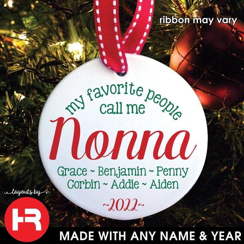May include: A white ceramic Christmas ornament with a red and white ribbon. The ornament reads "my favorite people call me Nonna" in green and red script, with names and the year 2022 below. The text "MADE WITH ANY NAME & YEAR" is at the bottom.