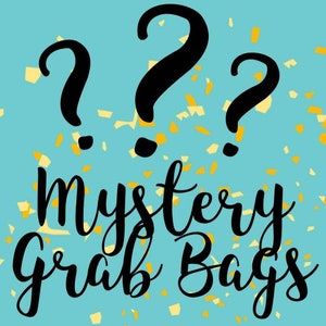 Mystery grab bags *2 shirts and free gift*