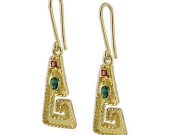 May include: Gold earrings with a geometric design featuring green and red gemstones.