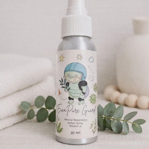 May include: A silver spray bottle with a white top and a label featuring a cartoon character in a football helmet. The label reads "Euca Pure Guard, Natural Respiratory Herbal Spray, Children 3+" and contains 80 ml.