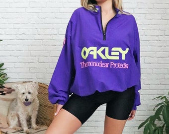 Vintage Oakley Surf Style Windbreaker / Talla única / Jersey púrpura Half Zip Surfer Beach Chaqueta / Ajuste unisex / Protección termonuclear de neón