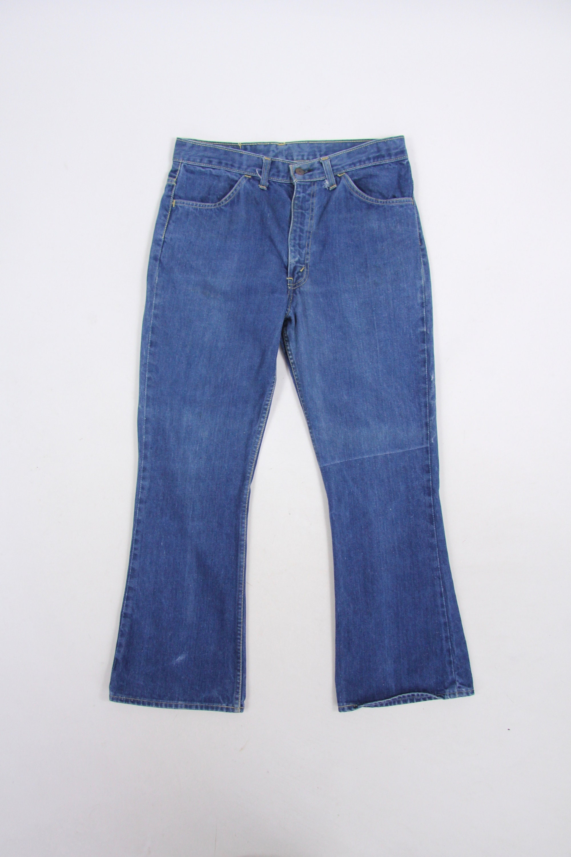 orange bootcut jeans
